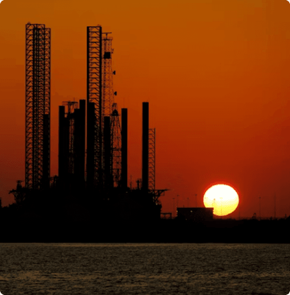 Oil rig at sunset